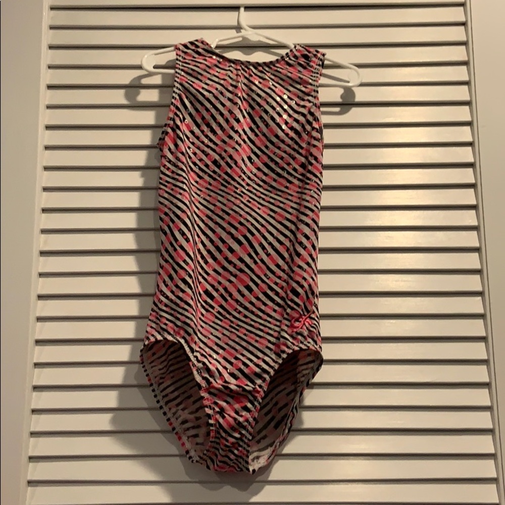 Pink, black, and White GK leotard